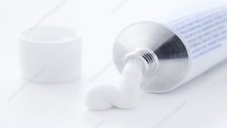 Medical cream coming out of the tube.